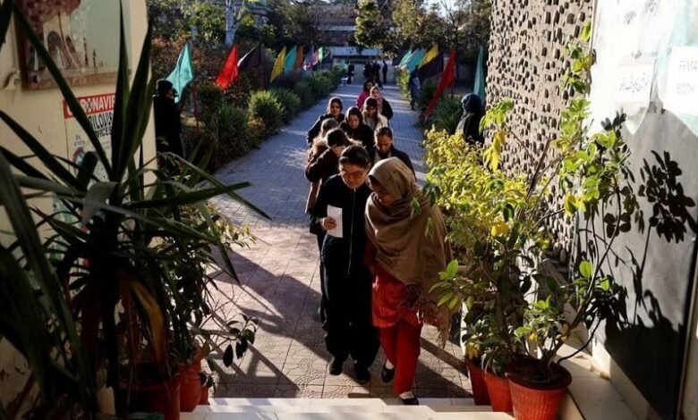 the voters enter a polling station in a school on the day of the general election in islamabad pakistan february 8 2024 photo reuters