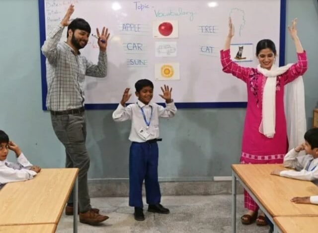 teachers lead a class of hearing impaired students at a school in lahore run by the charity deaf reach a non profit organisation working to empower disadvantaged deaf children and youths photo afp