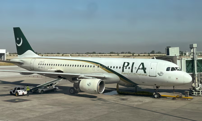 view of a pakistan international airlines pia passenger plane taken through a glass panel at islamabad international airport pakistan october 3 2023 photo reuters file