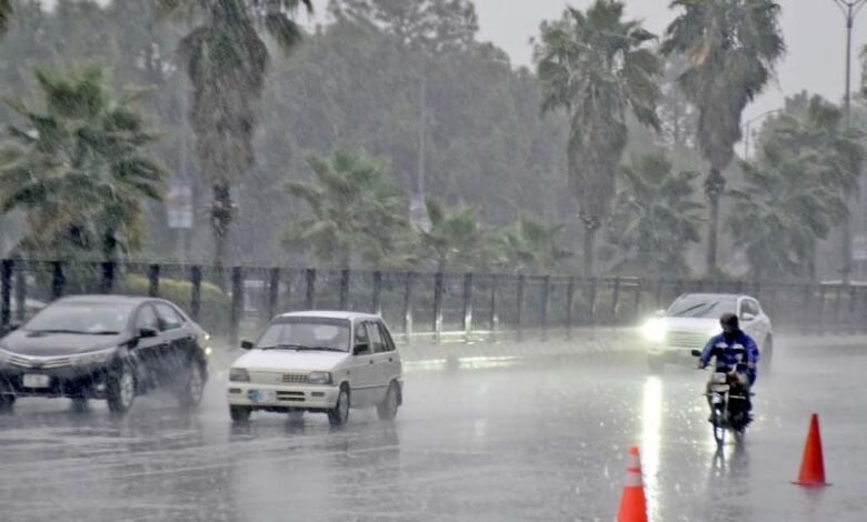 motorists drive slowly on a wet road on a rainy morning in islamabad photo online file