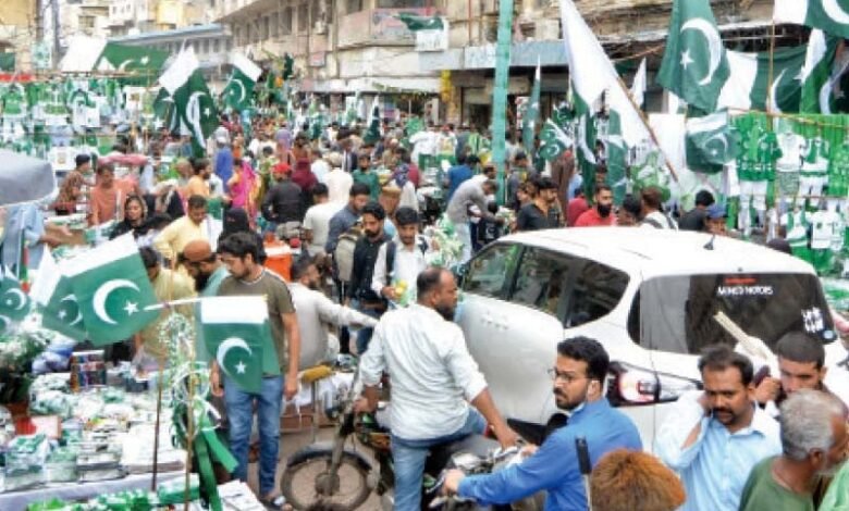 people throng the paper market to purchase flags buntings badges and other items to celebrate the independence day photo jalal qureshi express